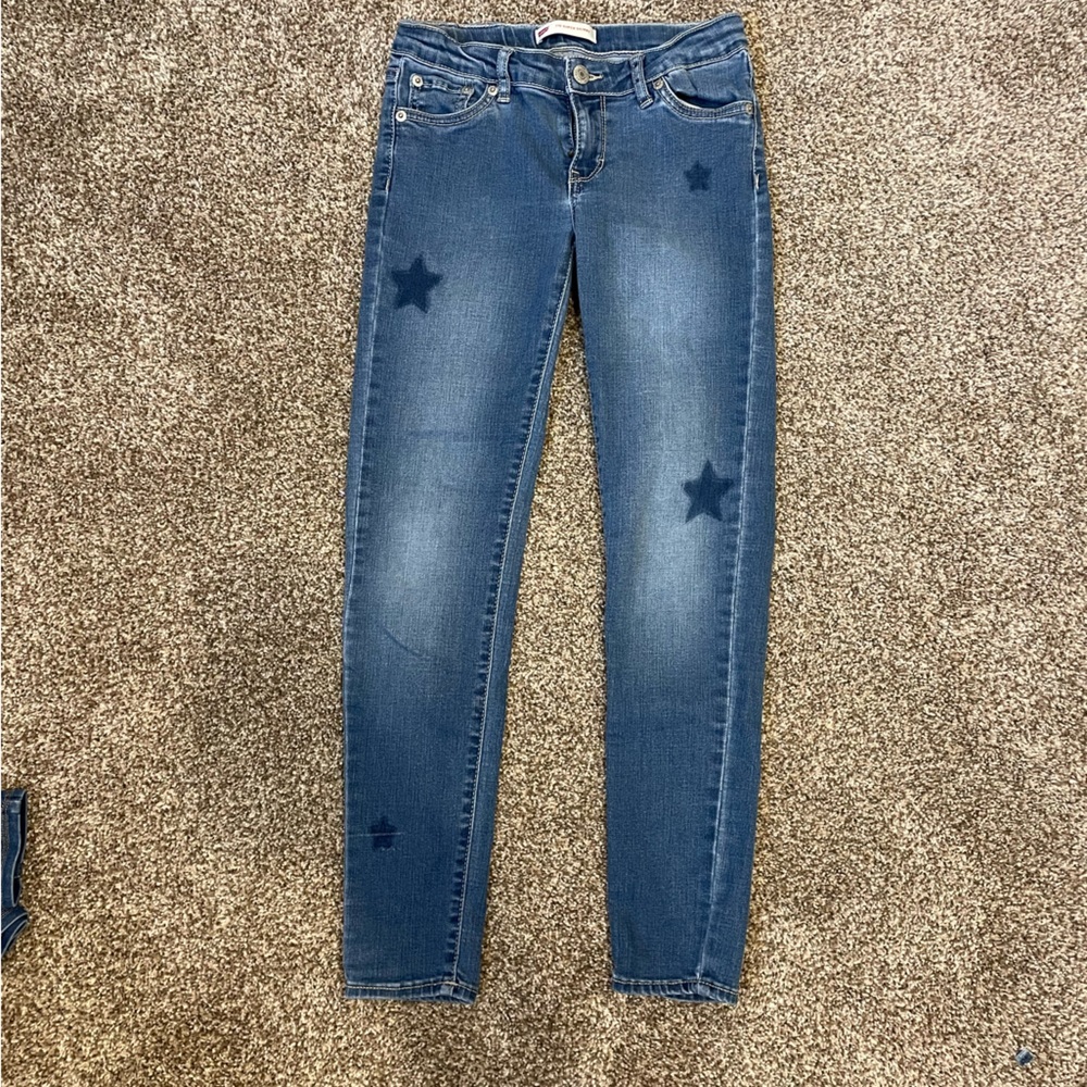 Levi’s Girls size 10 jeans. GUC with stars on front
